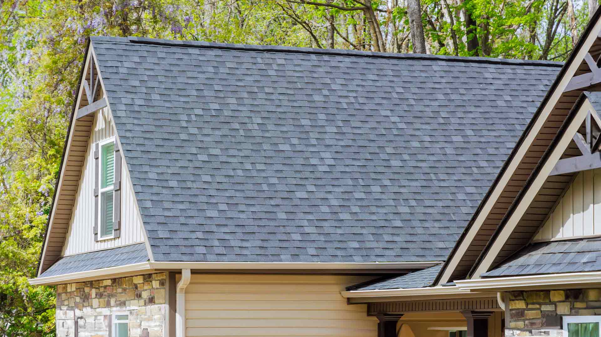 Asphalt shingles are used as roofing materials on roof of newly constructed house